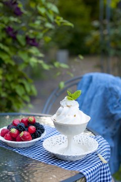 softijs with berries and cream. ice-cream with fruits in a cube