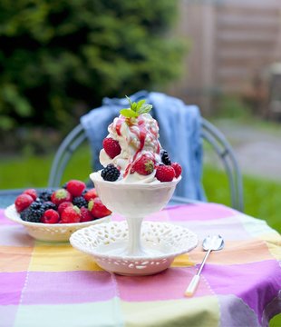softijs with berries and cream. ice-cream with fruits in a cube
