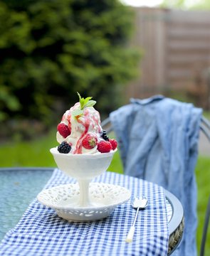 softijs with berries and cream. ice-cream with fruits in a cube
