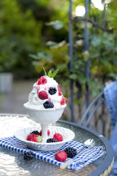 softijs with berries and cream. ice-cream with fruits in a cube