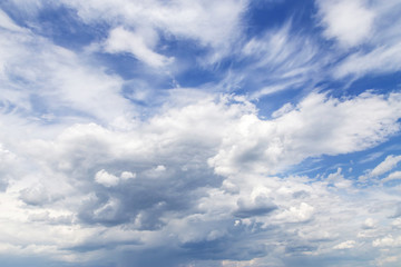 Fototapeta na wymiar Blue sky with white cumulus fluffy clouds texture background