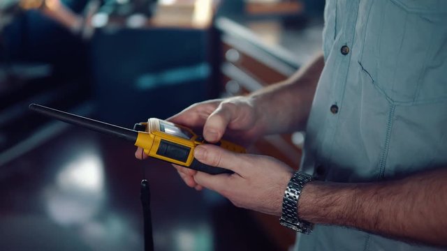 Hands of Deck Officer or seaman on navigation bridge of vessel or ship using VHF radio. Colreg safety and disstress communication