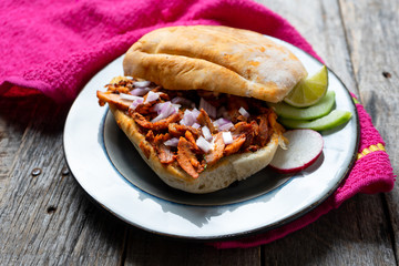 Mexican food: pork sandwich also known as 