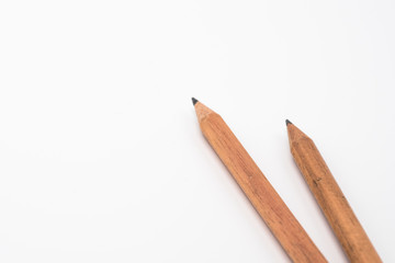 Two wooden pencil isolated on white background