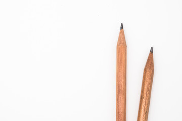 Two wooden pencil isolated on white background