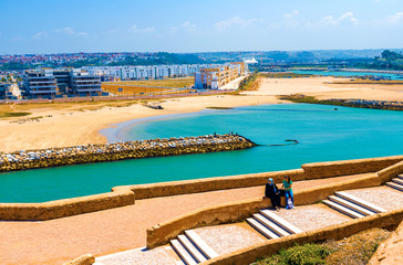 View of the ocean and the breakwaters that separate the mouth of the Bou Regreg river from the Atlantic Ocean. Rabat, Morocco.