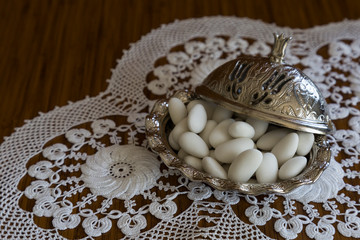 colorful sugars,almonds and candies in the plate for Muslim Ramadan feast.