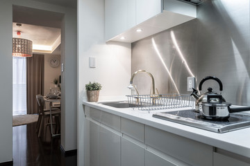 Small stainless steel kitchen set in a small apartment