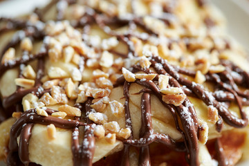Banana with chocolate and nuts