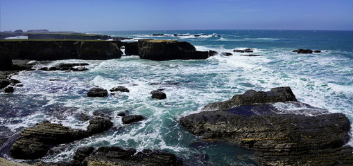 Fototapeta na wymiar Panoramic view of coastline scenery of blue sky with rocks and beach on Pacific Coast, California