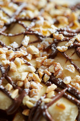 Banana with chocolate and nuts