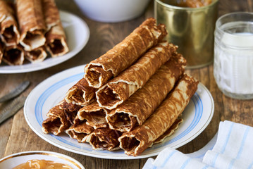 Homemade wafer rolls on a plate