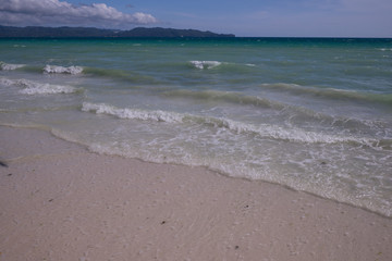 The waves on the beach