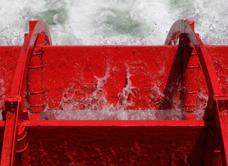 red boat in water
