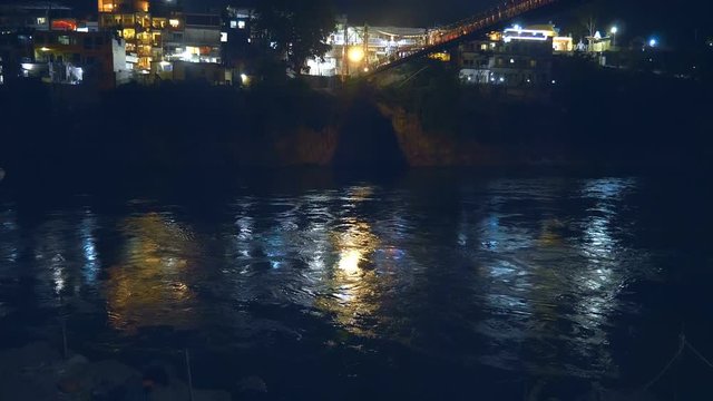 The lights of night city of Rishikesh, through which the Ganges River passes for the adherents of Hinduism, is the world capital of yoga, India