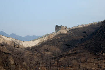 Fototapeta na wymiar Huanghuacheng China, winter view of Great Wall of China with farming terraces below