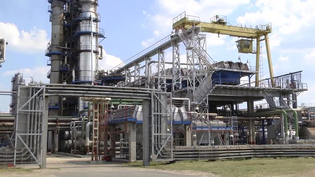 Refined chimney pipe of a petrochemical oil plant. catalyst, factory. Industrial zone,The equipment of oil refining,Close-up of industrial pipelines of an oil-refinery plant.