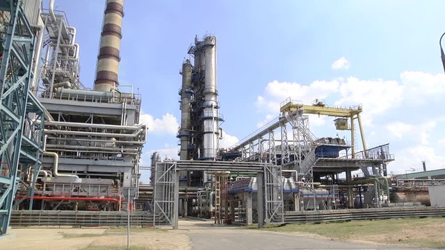 Refined chimney pipe of a petrochemical oil plant. catalyst, factory. Industrial zone,The equipment of oil refining,Close-up of industrial pipelines of an oil-refinery plant.