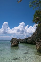 A seascape with rocks on a sunny day
