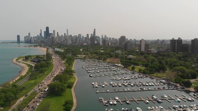 Aerial drone view of Chicago skyline over harbor