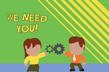 Handwriting text writing We Need You. Conceptual photo asking someone to work together for certain job or target Standing young couple sharing gear. Man tie woman skirt commerce relation