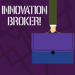 Text sign showing Innovation Broker. Business photo showcasing help to mobilise innovations and identify opportunities Businessman Hand Carrying Colorful Briefcase Portfolio with Stitch Applique