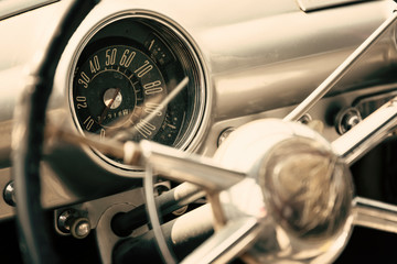 Fototapeta na wymiar Dashboard of a classic car, vintage vehicle close-up