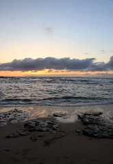Dusk and sun setting over a beautiful ocean