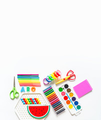 Stationery flat lay. Back to school. Chalk rainbow color
