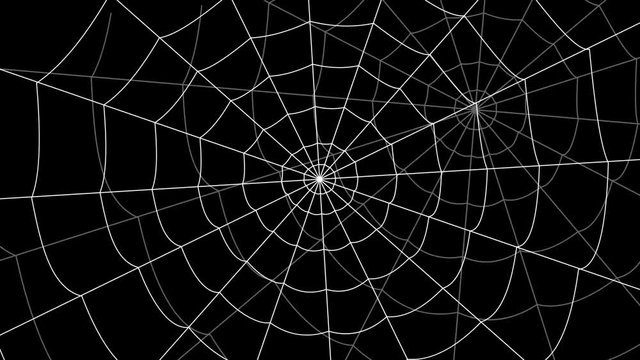 few cobwebs move against a black background