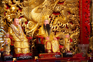 God goddess statue and decoration of San Chao Pu Ya chinese temple or great grandfather and grandmother ancestor shrine in Udonthani, Thailand