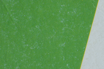 Macro image of worn green ink on paper