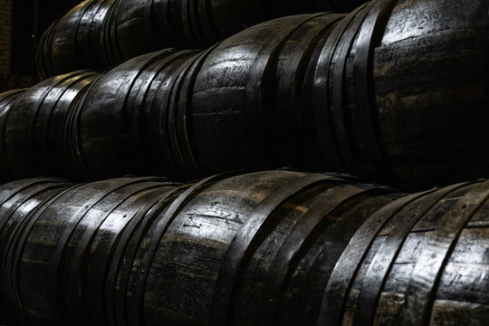old wooden barrels for whiskey or wine