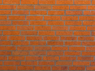 Bricks texture. Red, brown and orange brick wall.