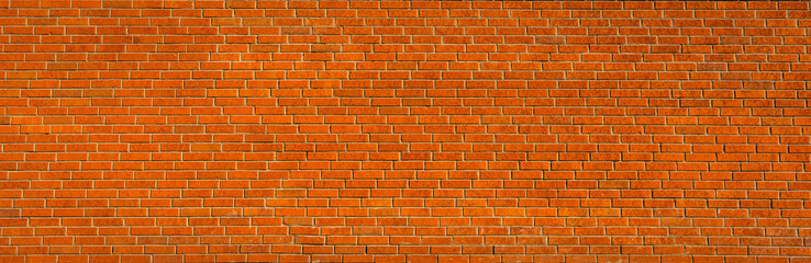 Bricks texture. Panorama large red orange brick wall pattern texture. Masonry background. 