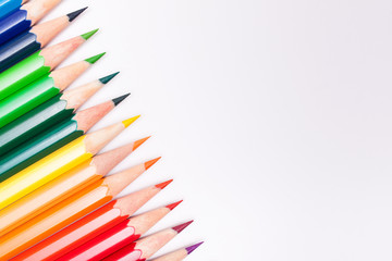 Colored pencils on white background