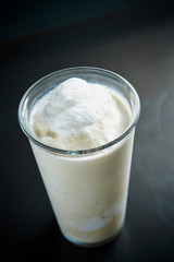 Vanilla shake in glass background 