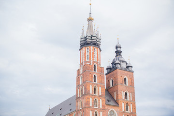 Obraz premium Tourism concept, look at view of city streets, centre of city. Vacation in Krakow