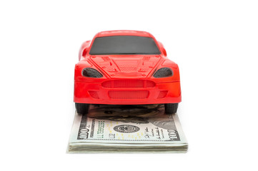  Car toy with money on a white.