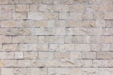 Decorative bricks on the wall of the house as a background