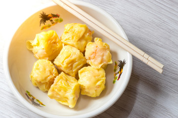 Close up  Siu Mai / Dim sum - Chinese steamed shrimp dumplings.