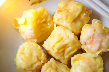 Close up  Siu Mai / Dim sum - Chinese steamed shrimp dumplings.