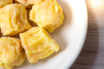 Close up  Siu Mai / Dim sum - Chinese steamed shrimp dumplings.