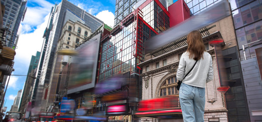 woman is walking around Manhattan