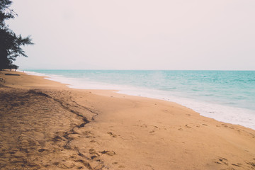 Sand beach and sea vintage background. Thailand.