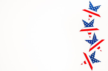 American Independence day background with blue, white and red mixed stars and hearts. Celebration of American independence day, the 4th of July (the Fourth of July). Holiday concept. With copy space. 