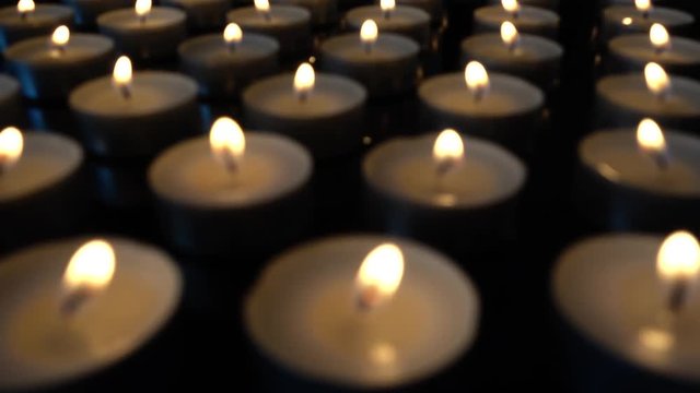 Candles on a black background.
