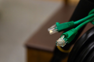 wire green format rj45 end on blurry background computer design base, information transfer internet