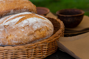 brown closeup close-up in a wicker basket stands on a table background culinary rustic appetizing pastry