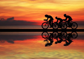 Fototapeta premium Cycling Silhouette on sunrise background